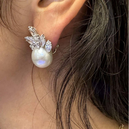 Marianne Ostier 1950s Platinum Pearl & Diamond Earrings on ear