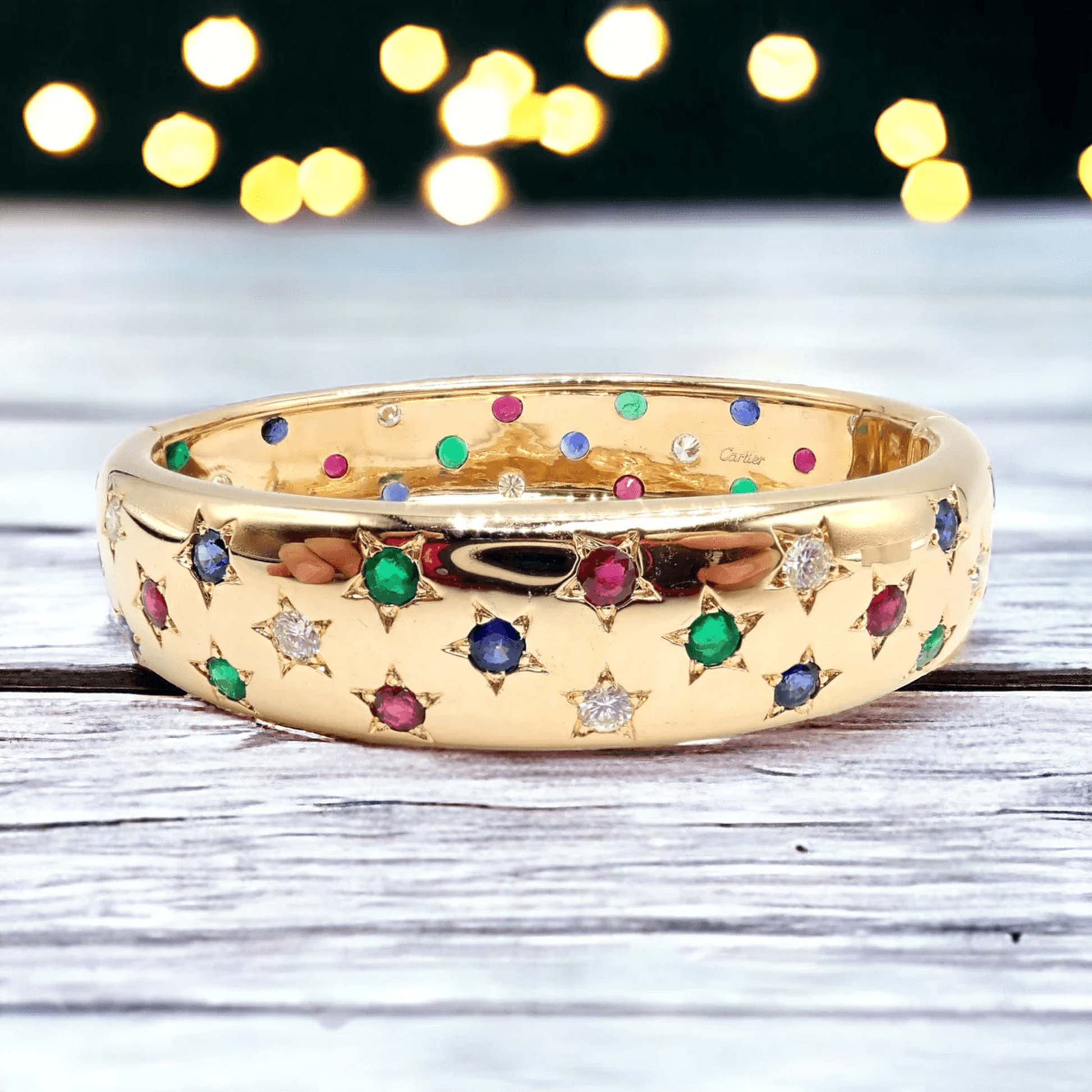 Cartier Post-1980s 18KT Yellow Gold Ruby, Diamond, Emerald & Sapphire Star Bracelet front