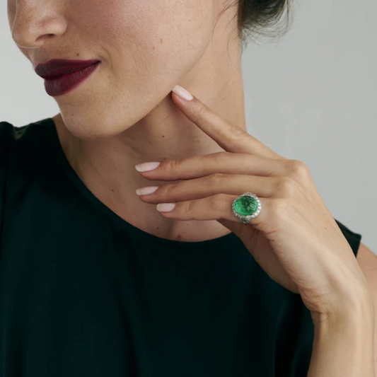 Art Deco Platinum Diamond & Emerald Ring on hand