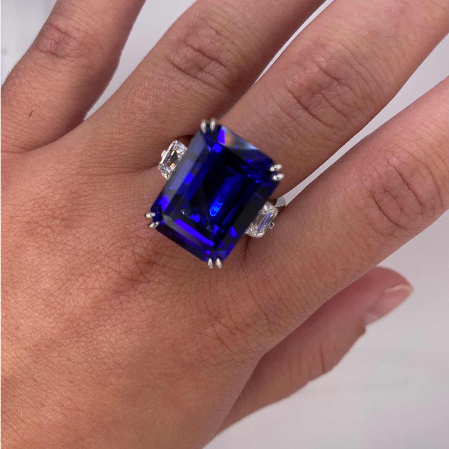 Contemporary Platinum Tanzanite & Diamond Ring on finger