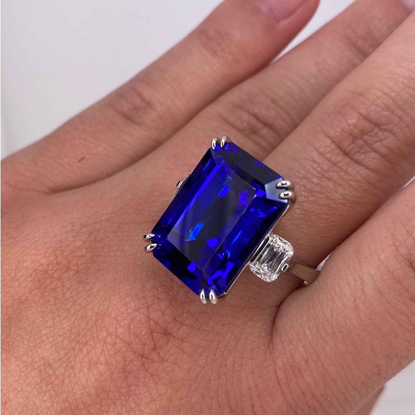 Contemporary Platinum Tanzanite & Diamond Ring on finger