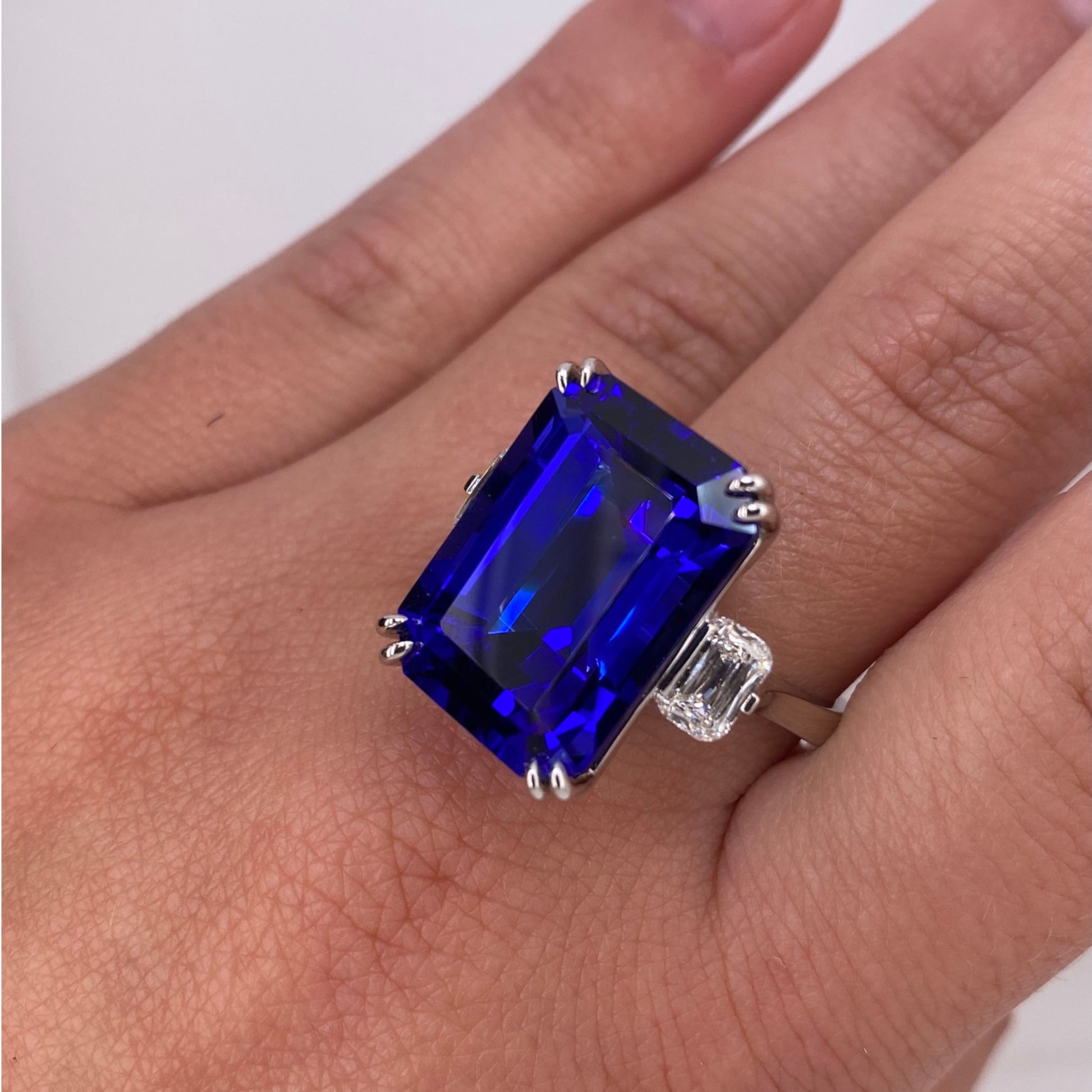 Contemporary Platinum Tanzanite & Diamond Ring on finger