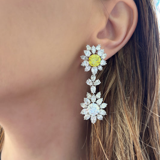 1960s Platinum Diamond Earrings on ear