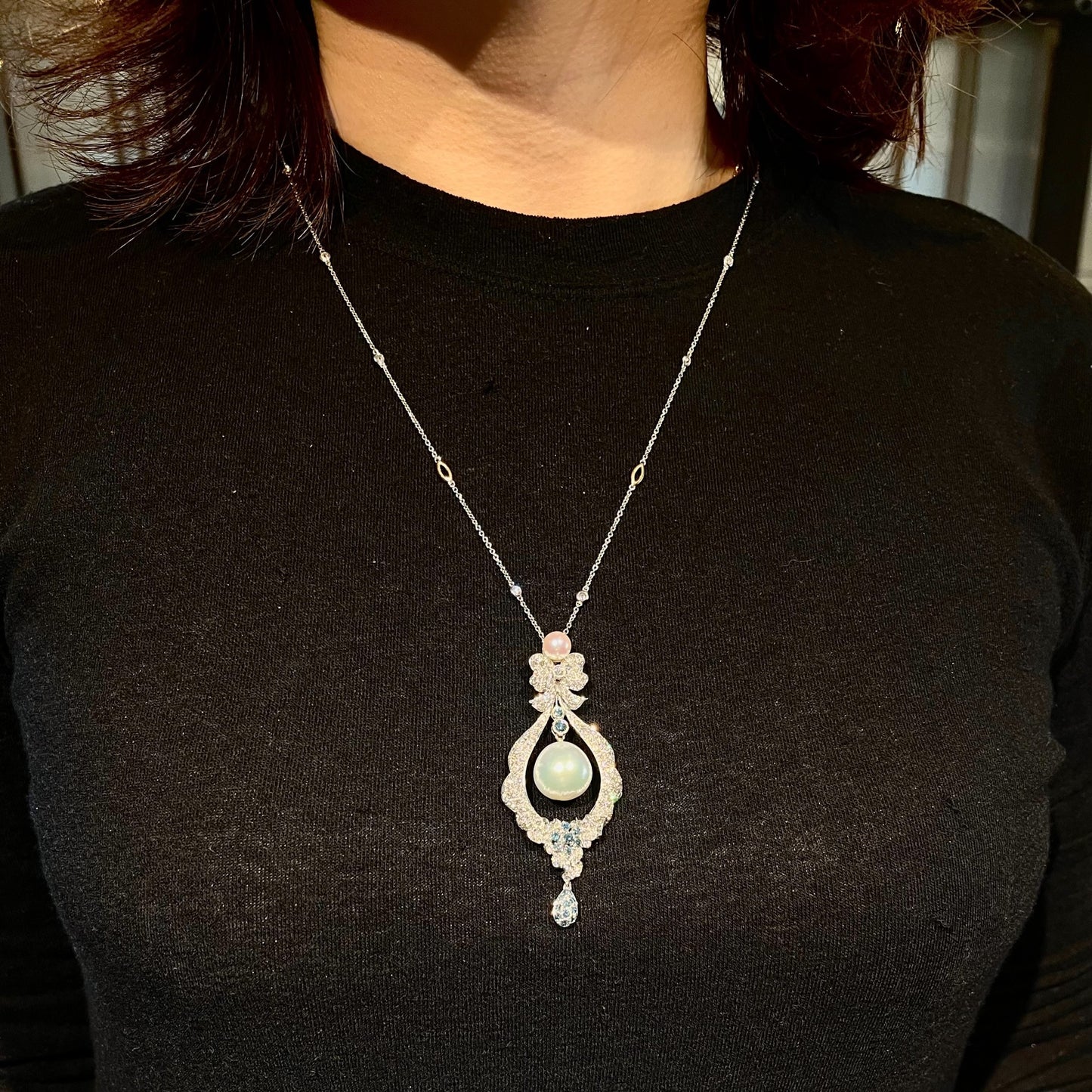 Contemporary 18KT White Gold Pearl, Diamond & Sapphire Pendant on neck