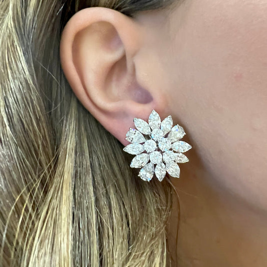 1960s Platinum Diamond Earrings on ear