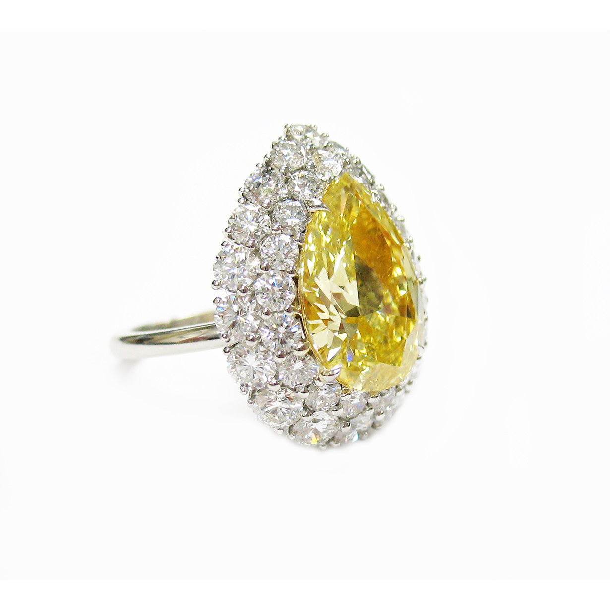 1980s Platinum Yellow Diamond Ring side