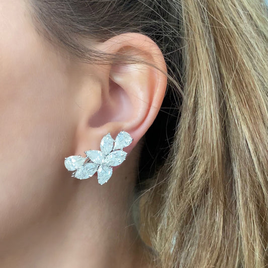 1980s Platinum Diamond Earrings on ear