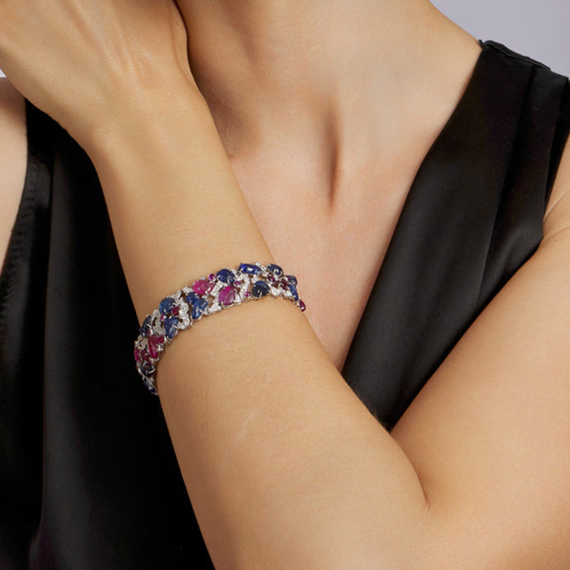 Art Deco Platinum Sapphire, Diamond & Ruby Tutti Frutti Bracelet on wrist