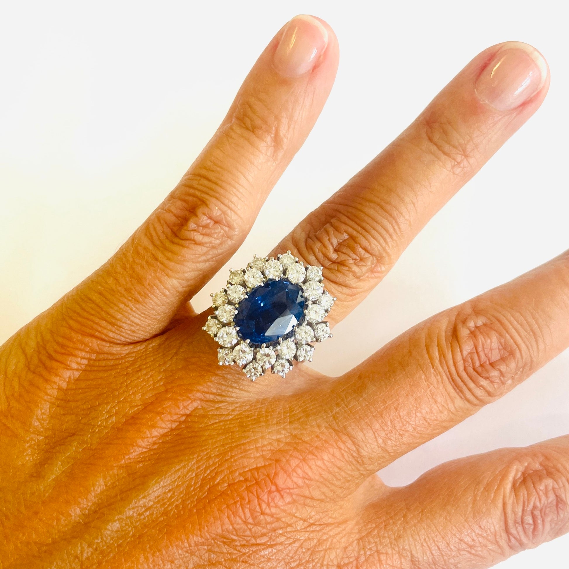 1980s 18KT White Gold Sapphire & Diamond Ring on finger