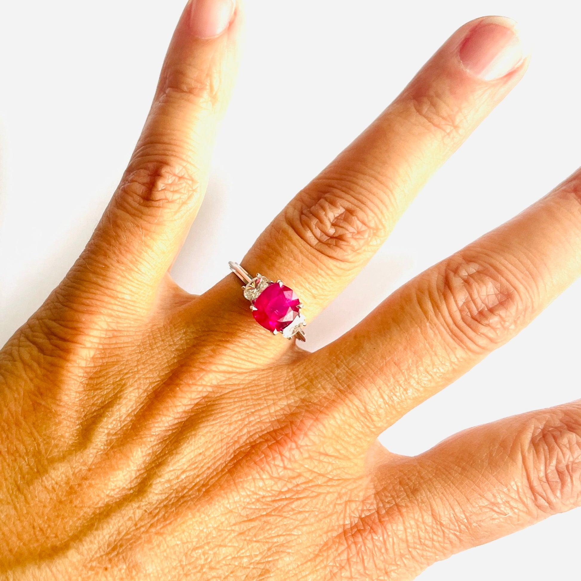 French 1980s 18KT White Gold Ruby & Diamond Ring on finger