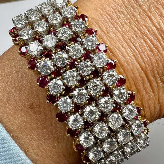 Hammerman Brothers Post-1980s Platinum & 18KT Yellow Gold Diamond & Ruby Bracelet on wrist