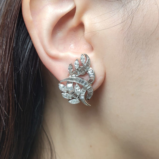 1980s Platinum Diamond Earrings on ear