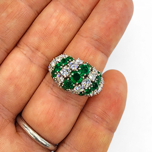 McTeigue & Co. 1960s Platinum Emerald & Diamond Ring on finger