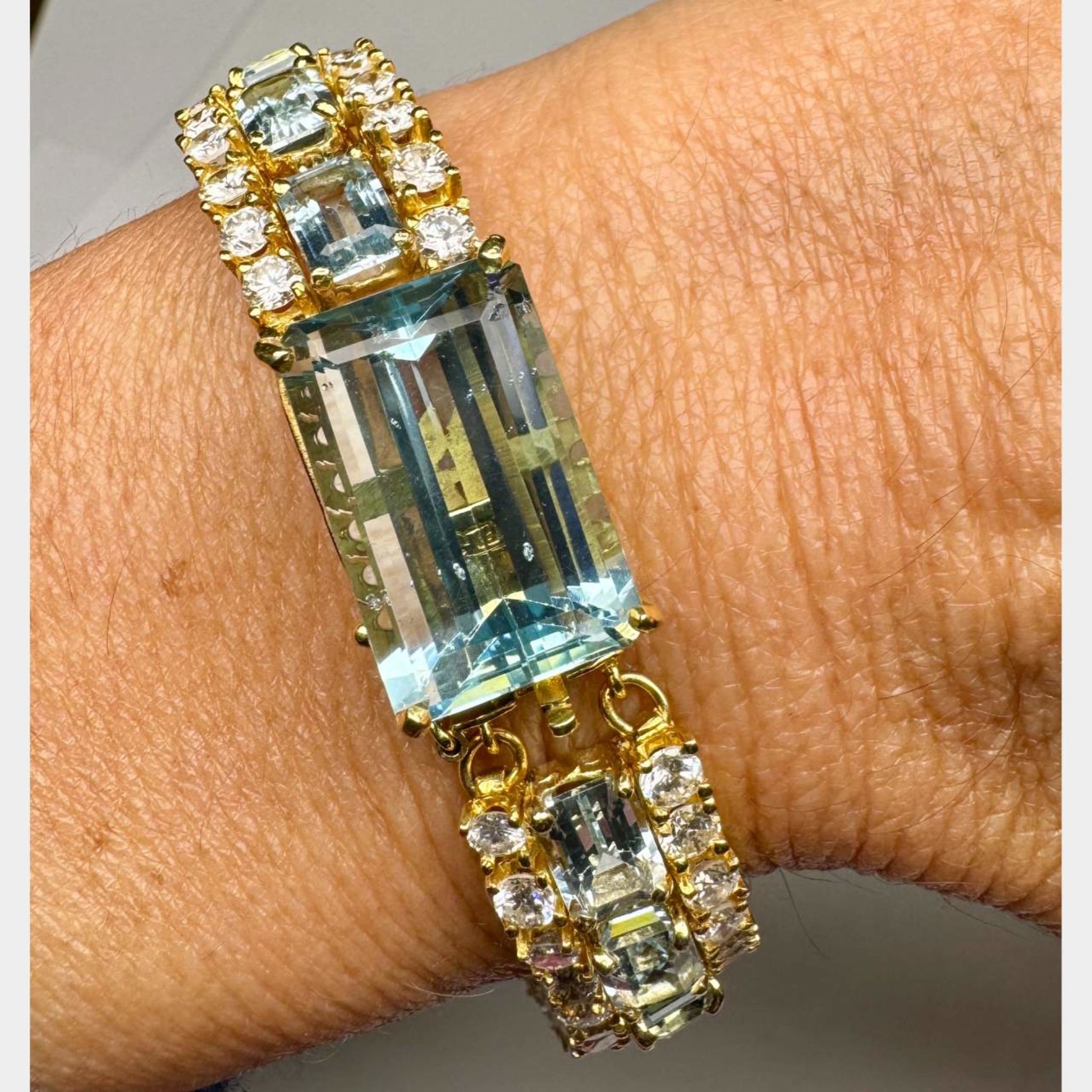 Post-1980s 18KT Yellow Gold Aquamarine & Diamond Bracelet on wrist