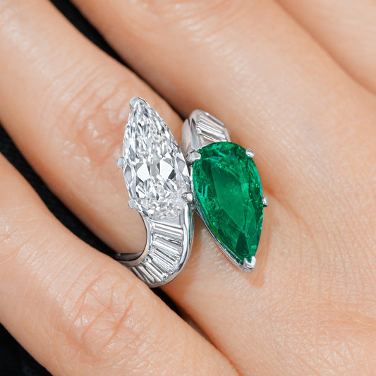 1980s Platinum Emerald & Diamond Ring on finger