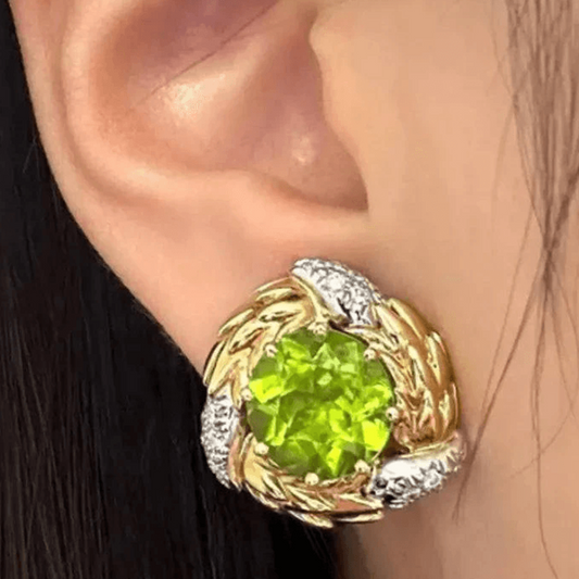 Tiffany & Co. Post-1980s Platinum & 18KT Yellow Gold Peridot & Diamond Earrings on ear
