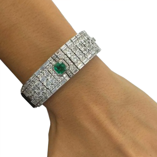Contemporary Platinum Diamond, Emerald & Onyx Bracelet on wrist