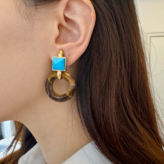Aldo Cipullo 1970s 18KT Yellow Gold Tiger's Eye & Turquoise Earrings on ear