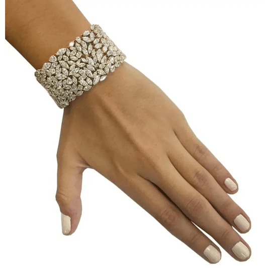 Contemporary 18KT Yellow Gold Diamond Bracelet on wrist