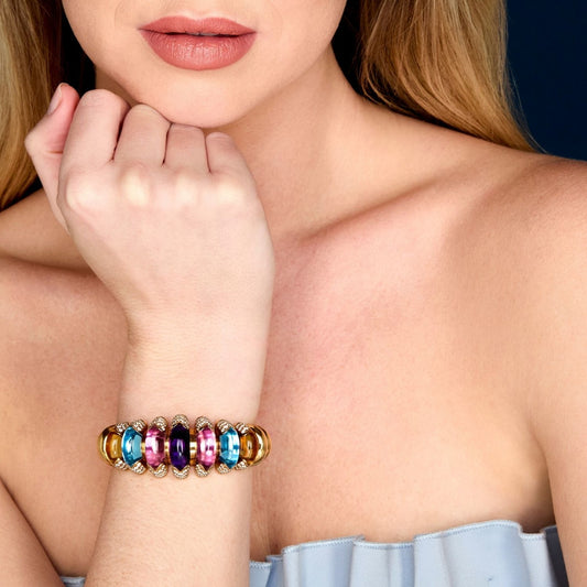 Bulgari Post-1980s 18KT Yellow Gold Multigem Celtaura Bracelet on wrist