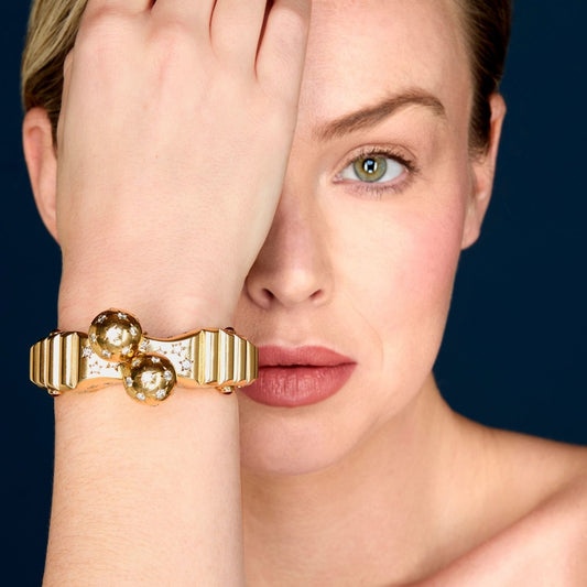 Seaman Schepps Retro 14KT Yellow Gold Diamond & Ruby Bracelet on wrist