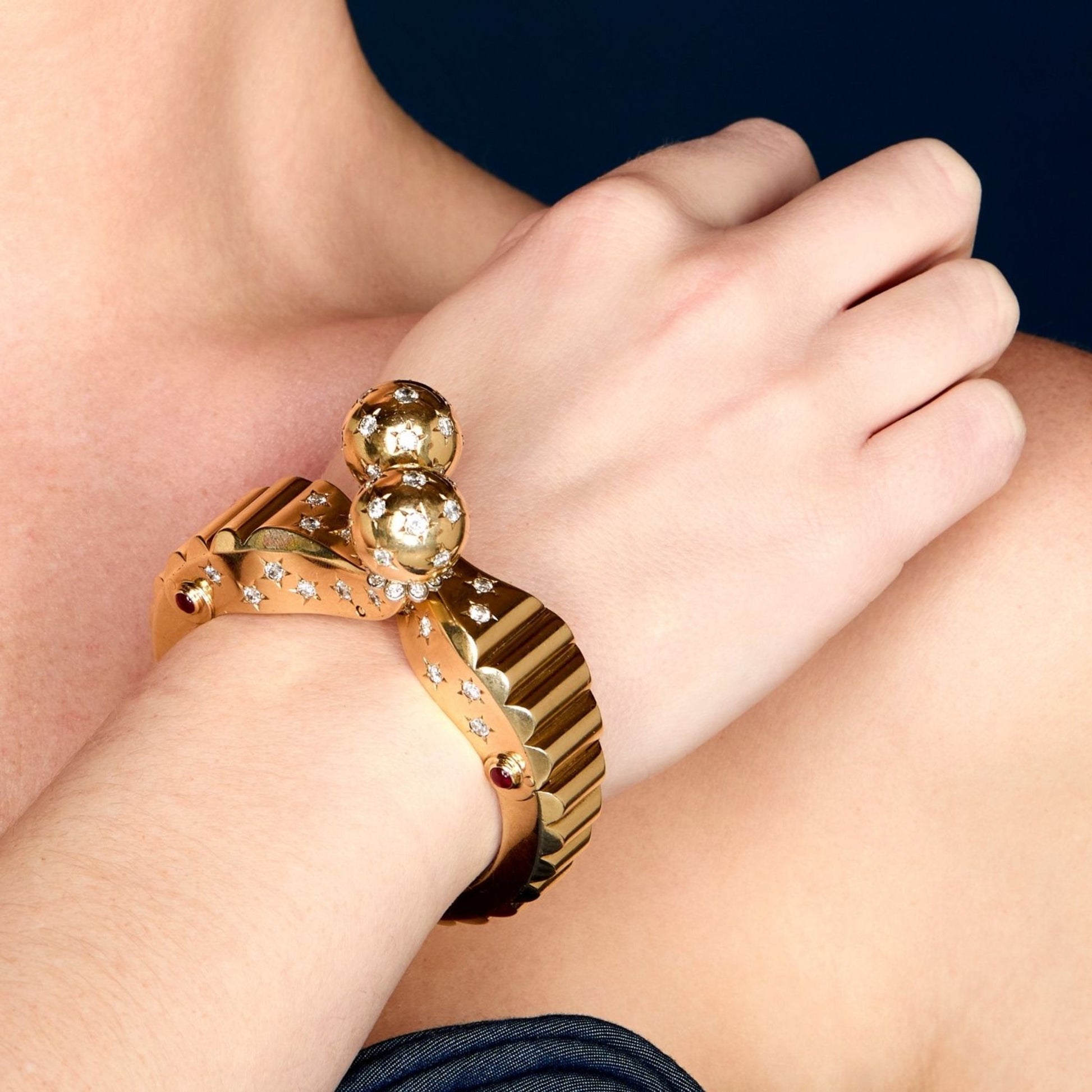Seaman Schepps Retro 14KT Yellow Gold Diamond & Ruby Bracelet on wrist