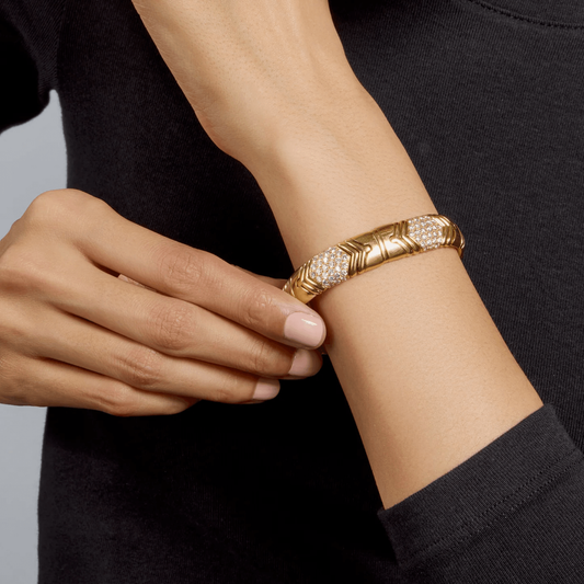 Bulgari Italy Post-1980s 18KT Yellow Gold Diamond Parentesi Bracelet on wrist