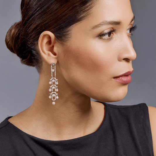 Art Deco Platinum Diamond & Natural Pearl Earrings on ear