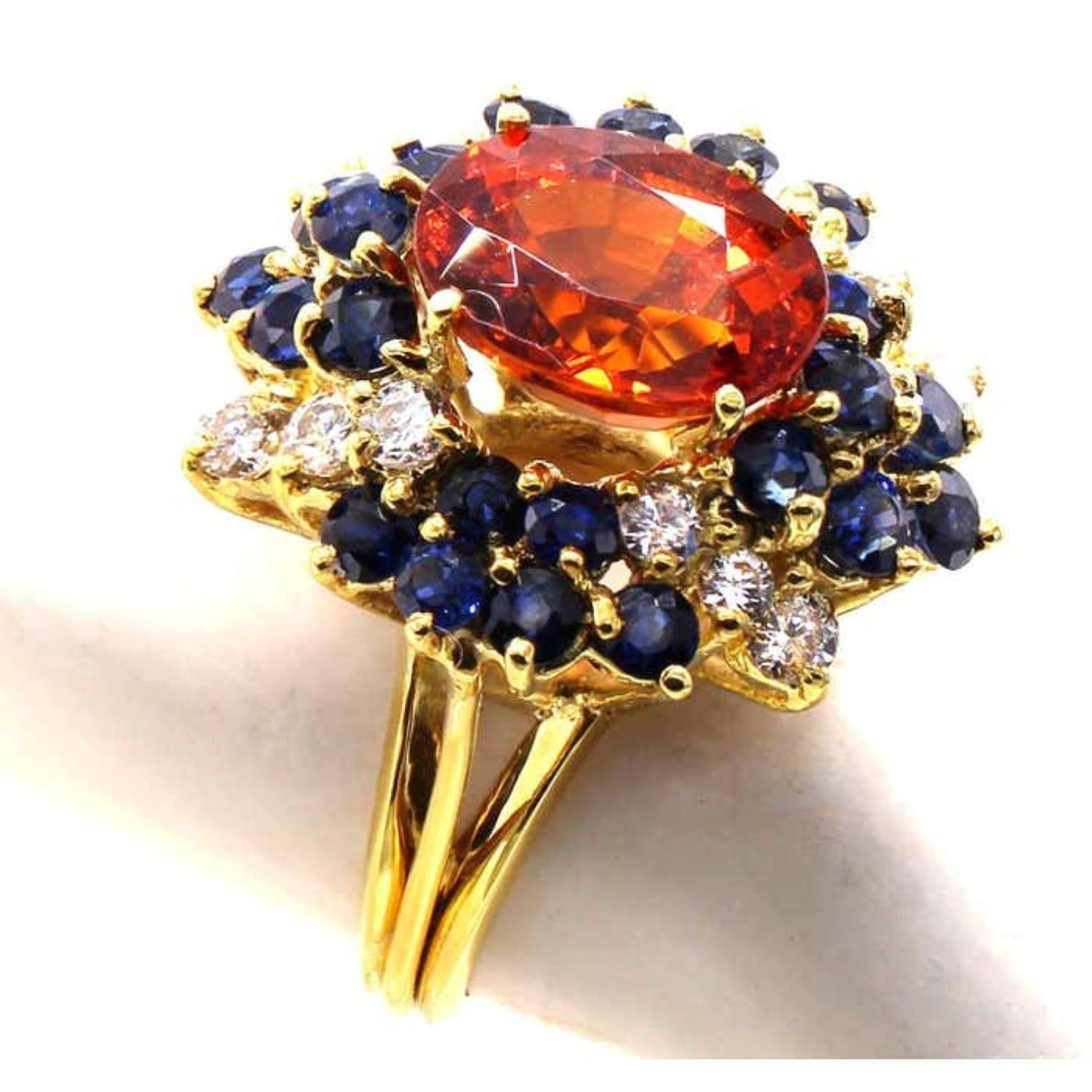 1970s 18KT Yellow Gold Garnet, Diamond & Sapphire Ring side