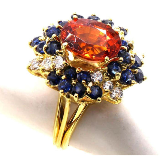 1970s 18KT Yellow Gold Garnet, Diamond & Sapphire Ring side
