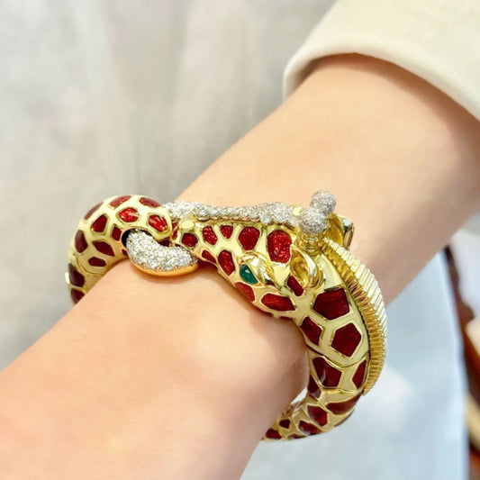 David Webb Post-1980s 18KT Yellow Gold Diamond, Emerald & Enamel Giraffe Bracelet on wrist