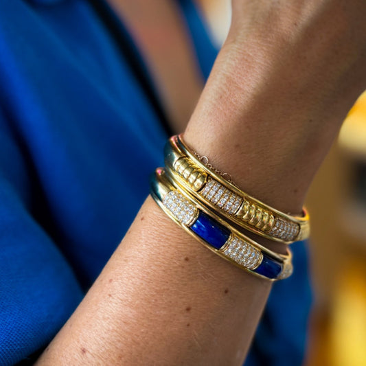 Boucheron France 1980s 18KT Yellow Gold Diamond, Lapis Lazuli & Wood Set on wrist