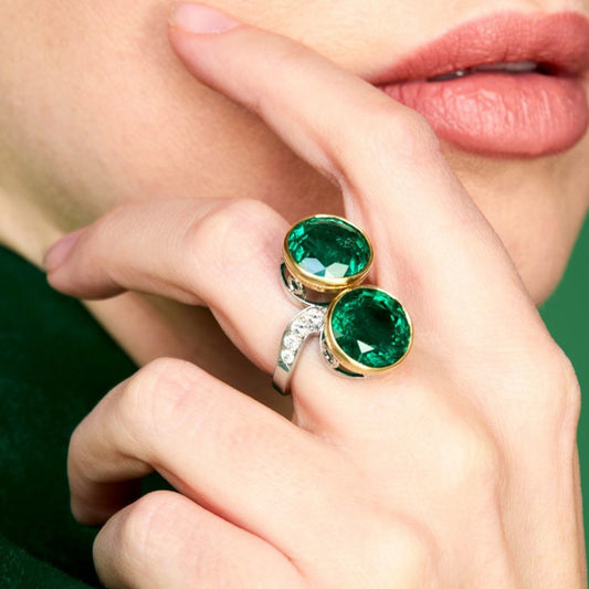 Bulgari 1980s 18KT White & Yellow Gold Emerald & Diamond Ring on finger