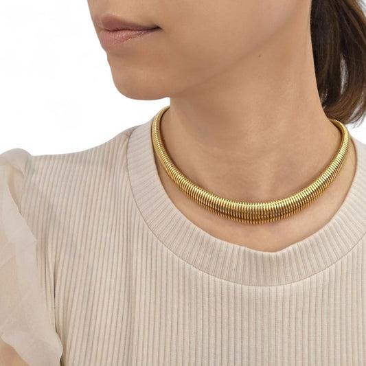 French 1970s 18KT Yellow Gold Tubogas Necklace on neck