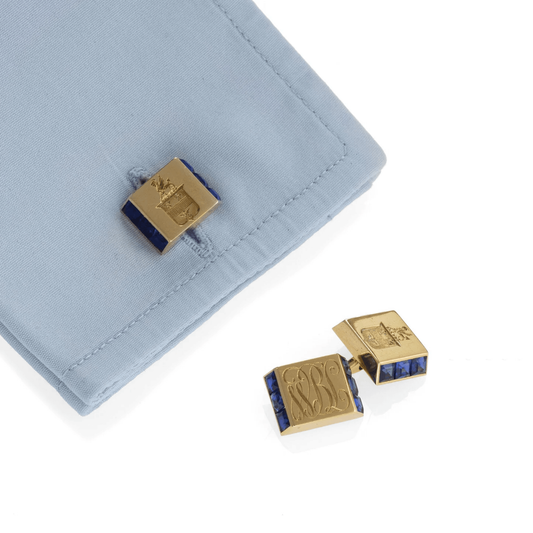 Cartier 1960s 18KT Yellow Gold Sapphire Cufflinks on cuff