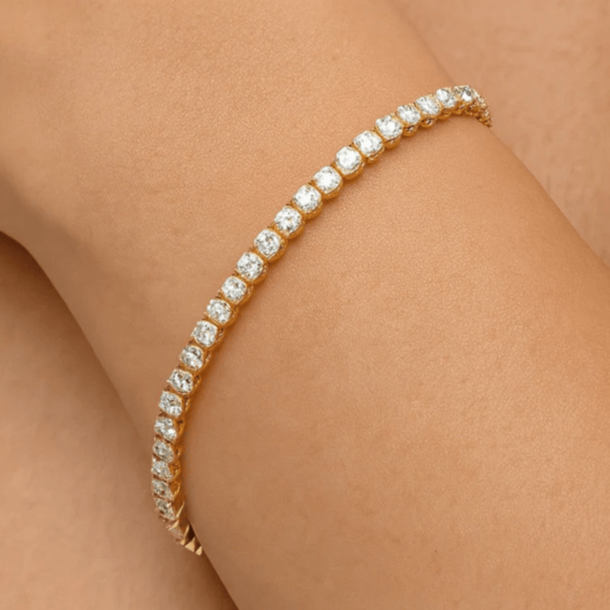 Contemporary 18KT Yellow Gold Diamond Bracelet on wrist