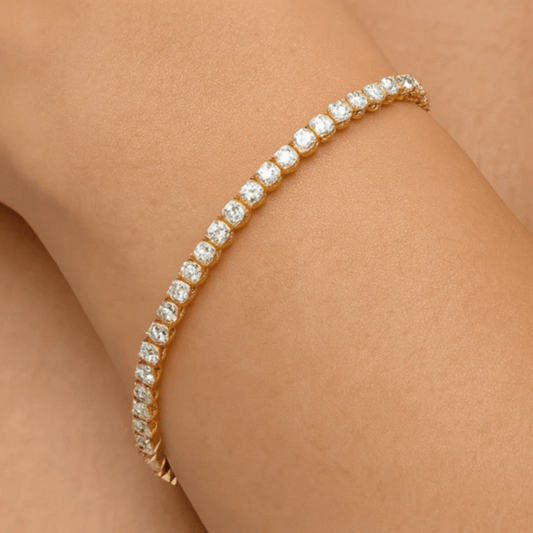 Contemporary 18KT Yellow Gold Diamond Bracelet on wrist