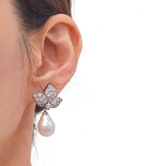 1950s Platinum Cultured Pearl & Diamond Earrings on ear