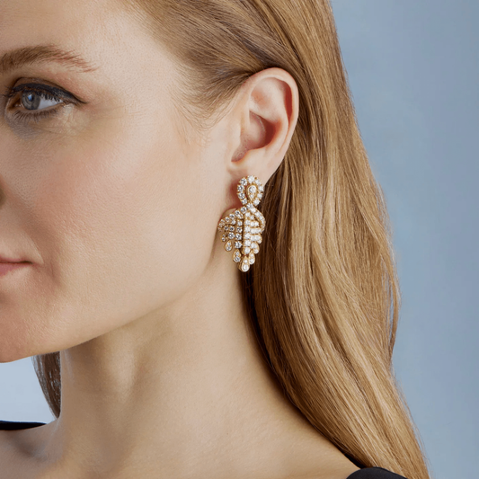 Fred Paris 1980s 18KT Yellow Gold Diamond Earrings on ear