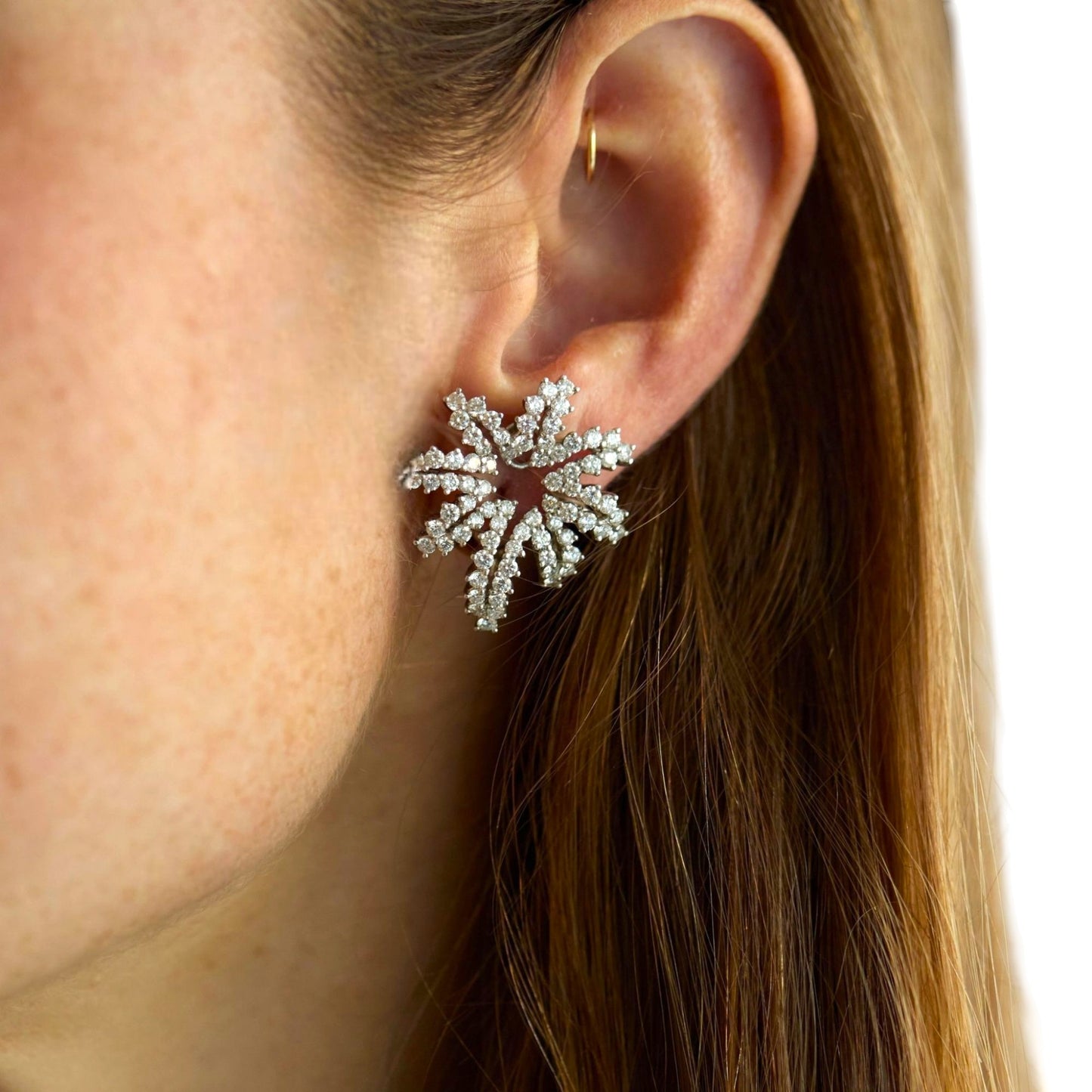 Tiffany & Co. Post-1980s Platinum & 18KT Yellow Gold Diamond Fireworks Earrings on ear