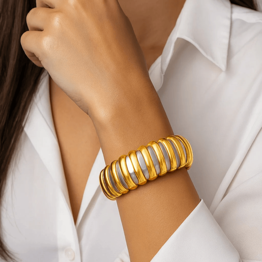 Bulgari Post-1980s 18KT Yellow Gold & Stainless Steel Bracelet on wrist