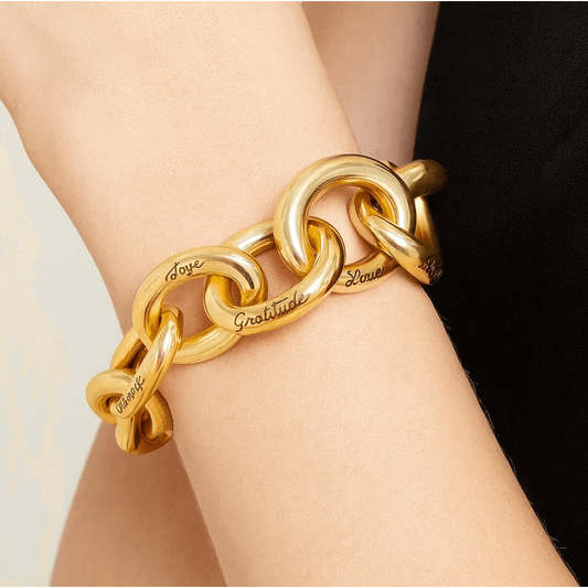 Diane von Fürstenberg Post-1980s 18KT Yellow Gold Bracelet on wrist