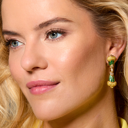 Bulgari 1980s 18KT Yellow Gold Emerald & Diamond Earrings on ear 