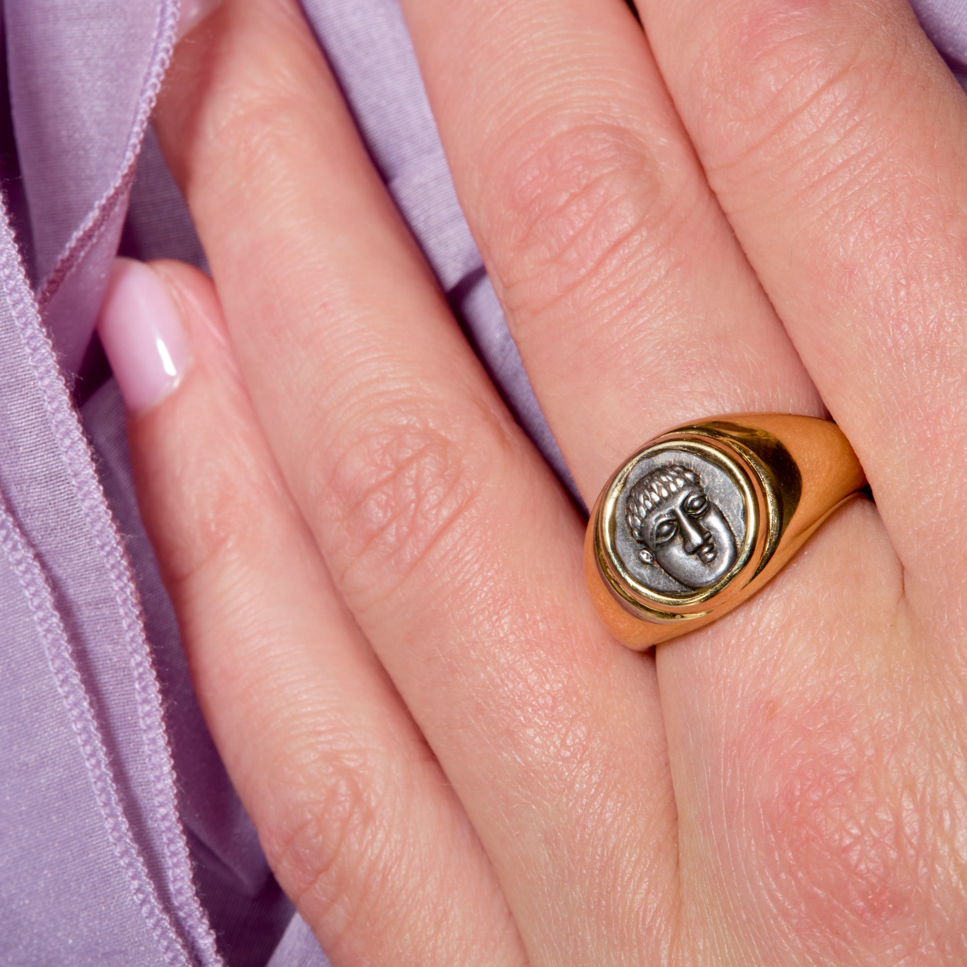 Bulgari 1980s 18KT Yellow Gold Monete Ring on finger