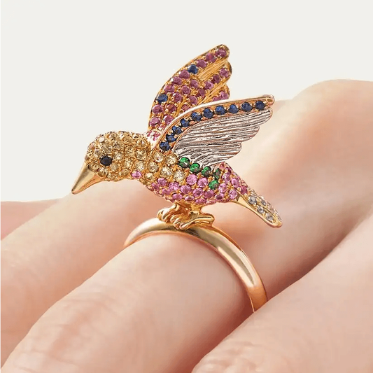 Mio Harutaka Post-1980s 18KT Yellow Gold Diamond, Garnet & Sapphire Bird Ring on finger