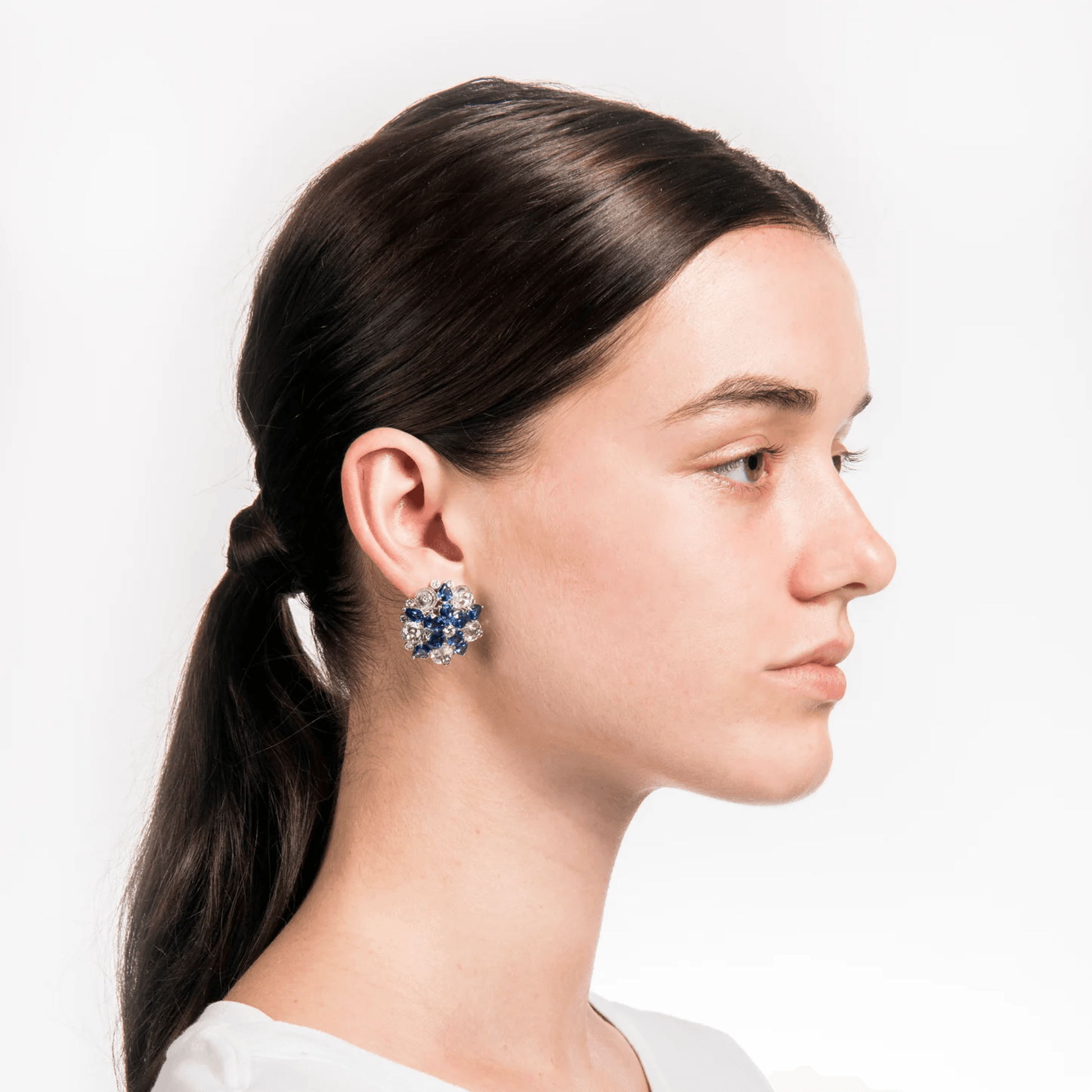 Aletto Bros Post-1980s Platinum Sapphire, Diamond & Rock Crystal Earrings on ear