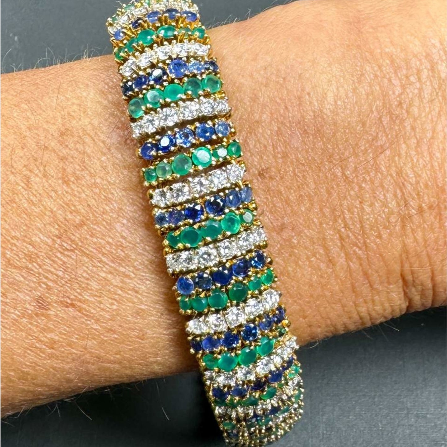 1960s 18KT Yellow Gold Diamond, Onyx & Sapphire Bracelet on wrist