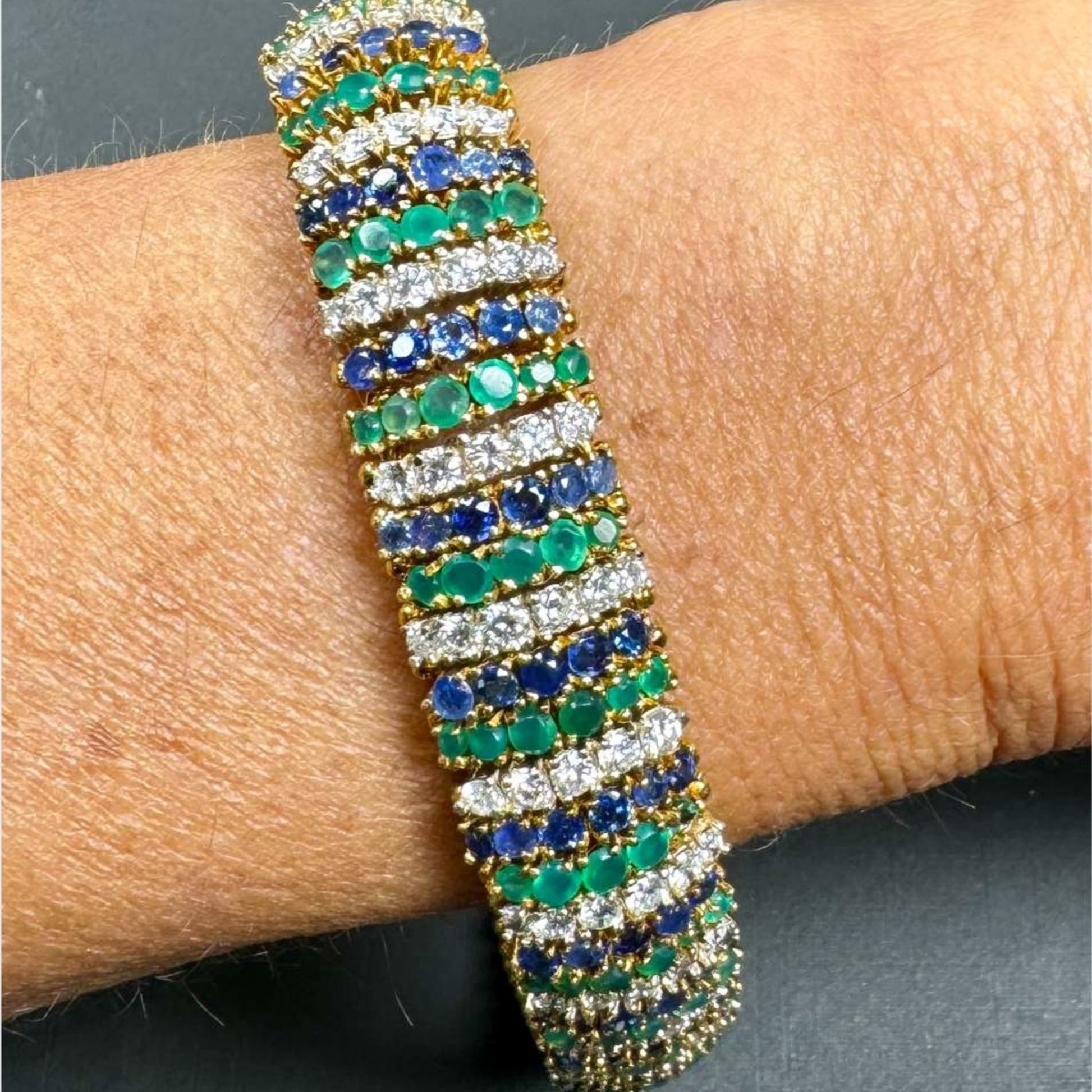 1960s 18KT Yellow Gold Diamond, Onyx & Sapphire Bracelet on wrist