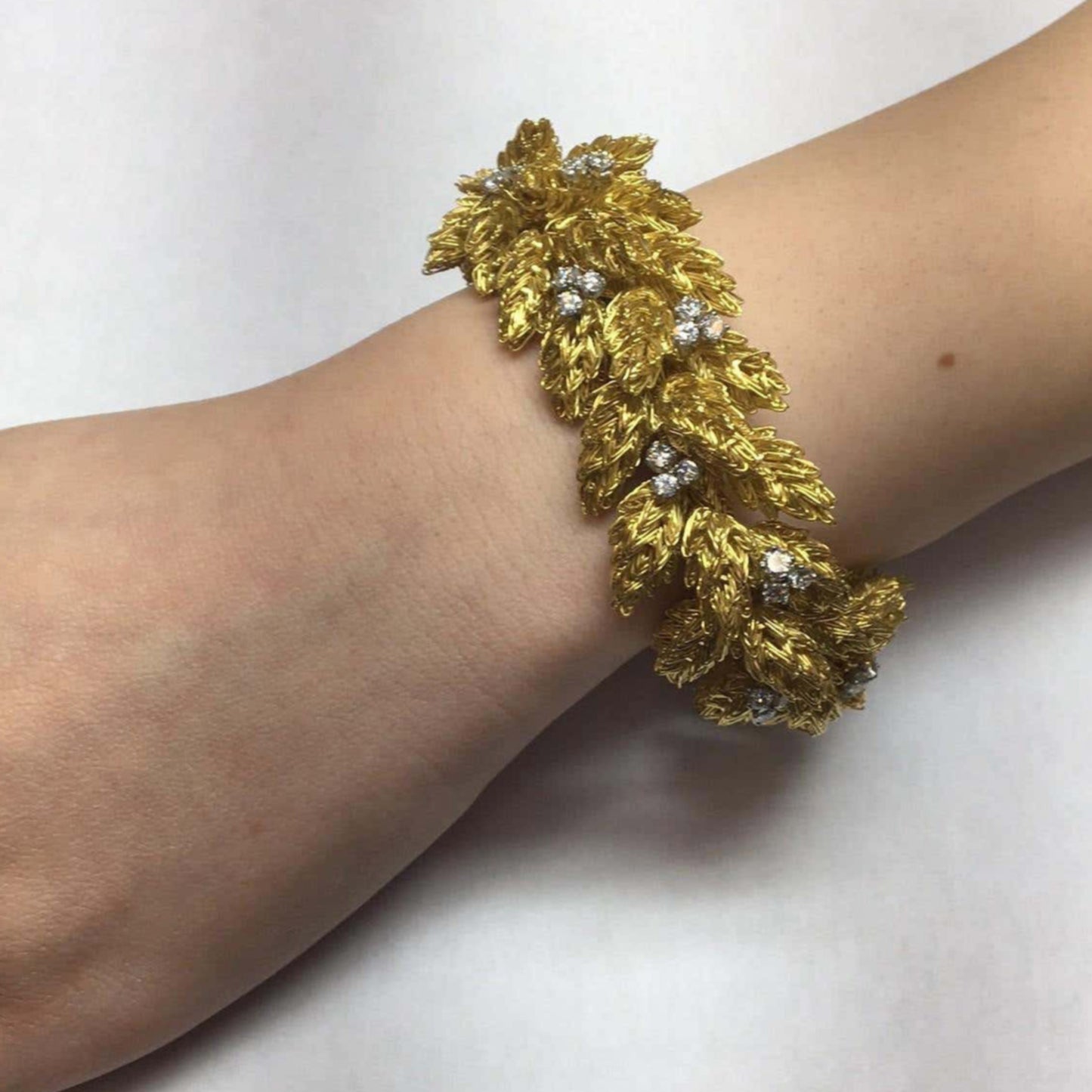 Cartier France 1970s 18KT Yellow Gold Diamond Bracelet on wrist