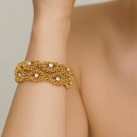 French 1980s 18KT Yellow Gold Diamond Bracelet on wrist